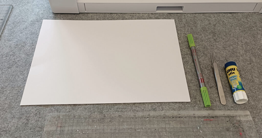 cardboard, plotter, glue and pen